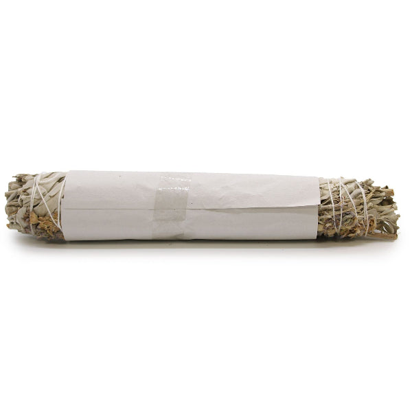 Rolled sage smudge stick with white paper wrap on a white background