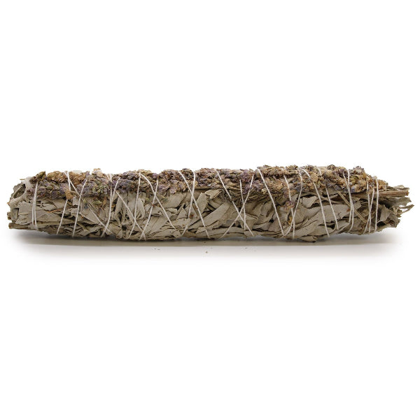 Sage smudge stick on a white background