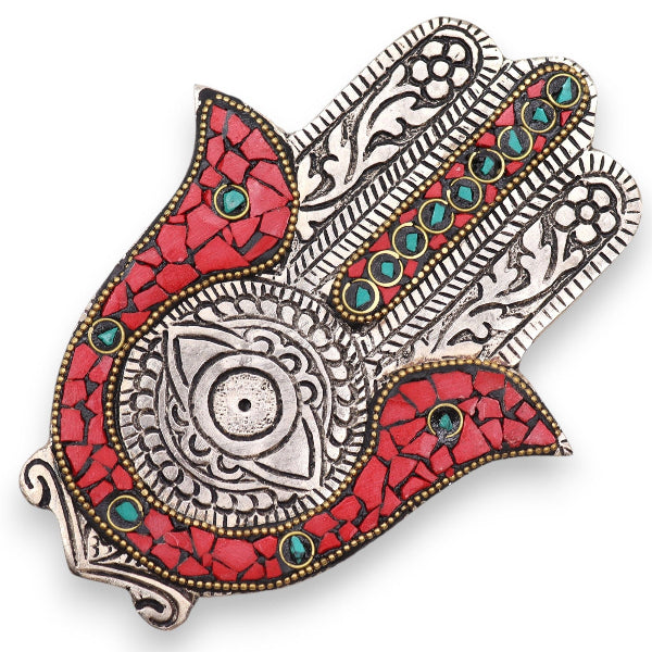 Decorative wall art piece with red, silver, and turquoise patterns on a white background