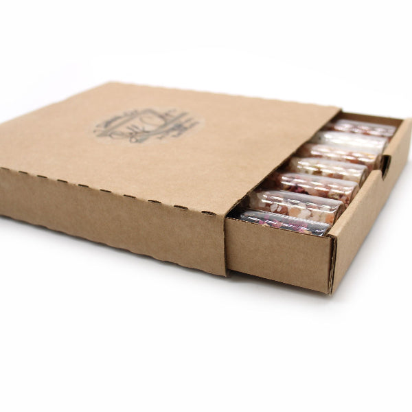 Cardboard box with tea bags on a white background