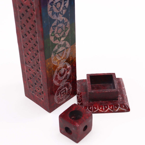 Decorative red boxes with intricate patterns on a white background