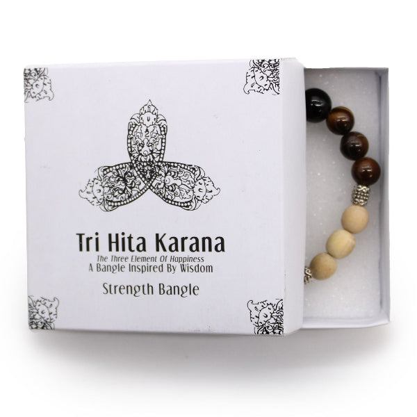Tri Hita Karana strength bangle in a white box on a white background