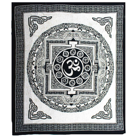 Decorative black and white tapestry with Om symbol and intricate patterns