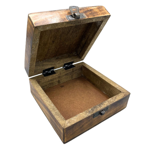 Wooden jewelry box with a lock on a white background