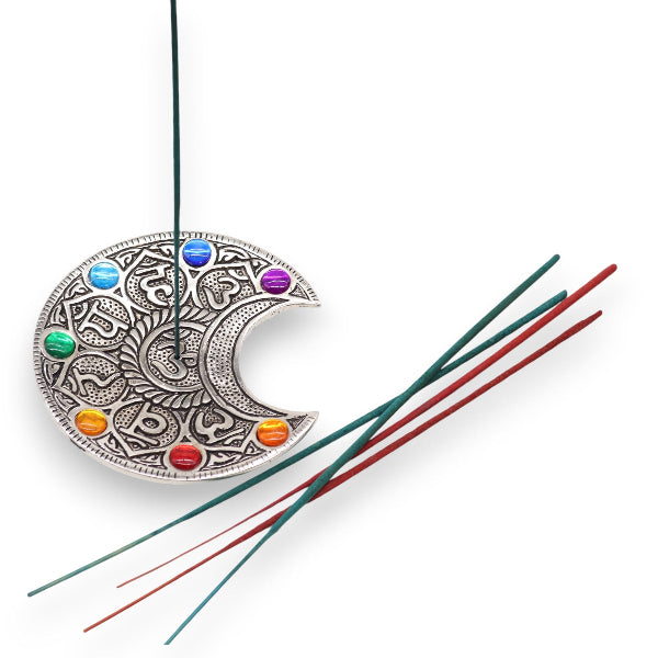 Decorative necklace with a crescent moon design and colorful beads on a white background