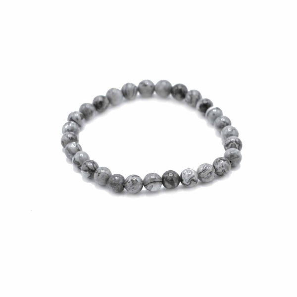 Gray beaded bracelet on a white background