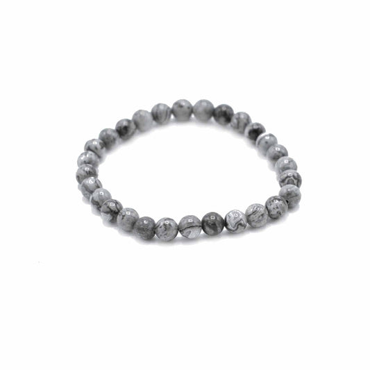 Gray beaded bracelet on a white background
