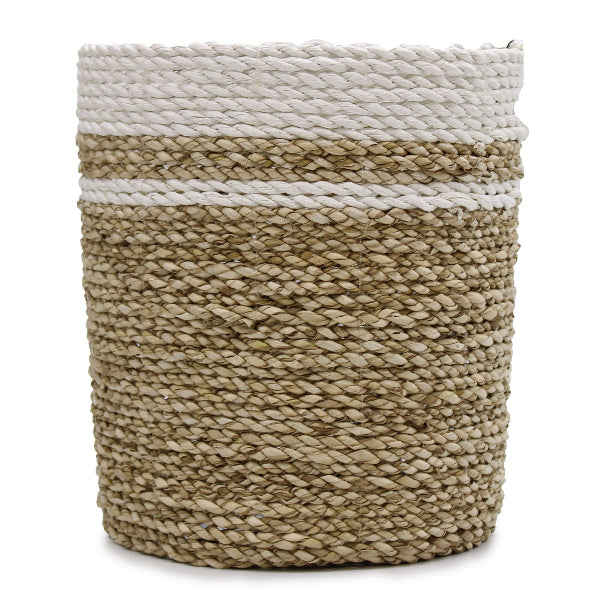 Woven basket with natural and white stripes on a white background