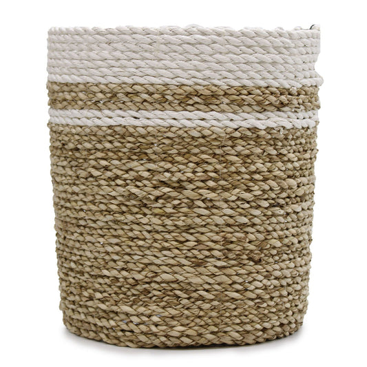 Woven basket with natural and white stripes on a white background
