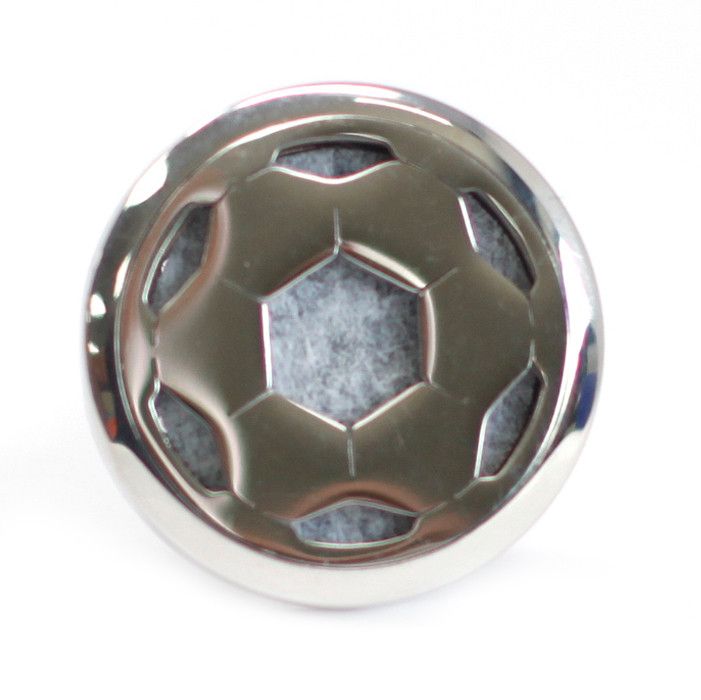 Metallic soccer ball emblem on a white background