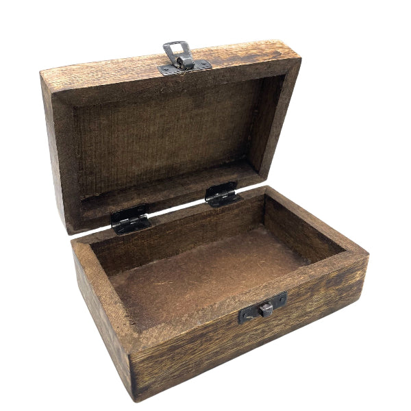 Wooden jewelry box with a lock on a white background