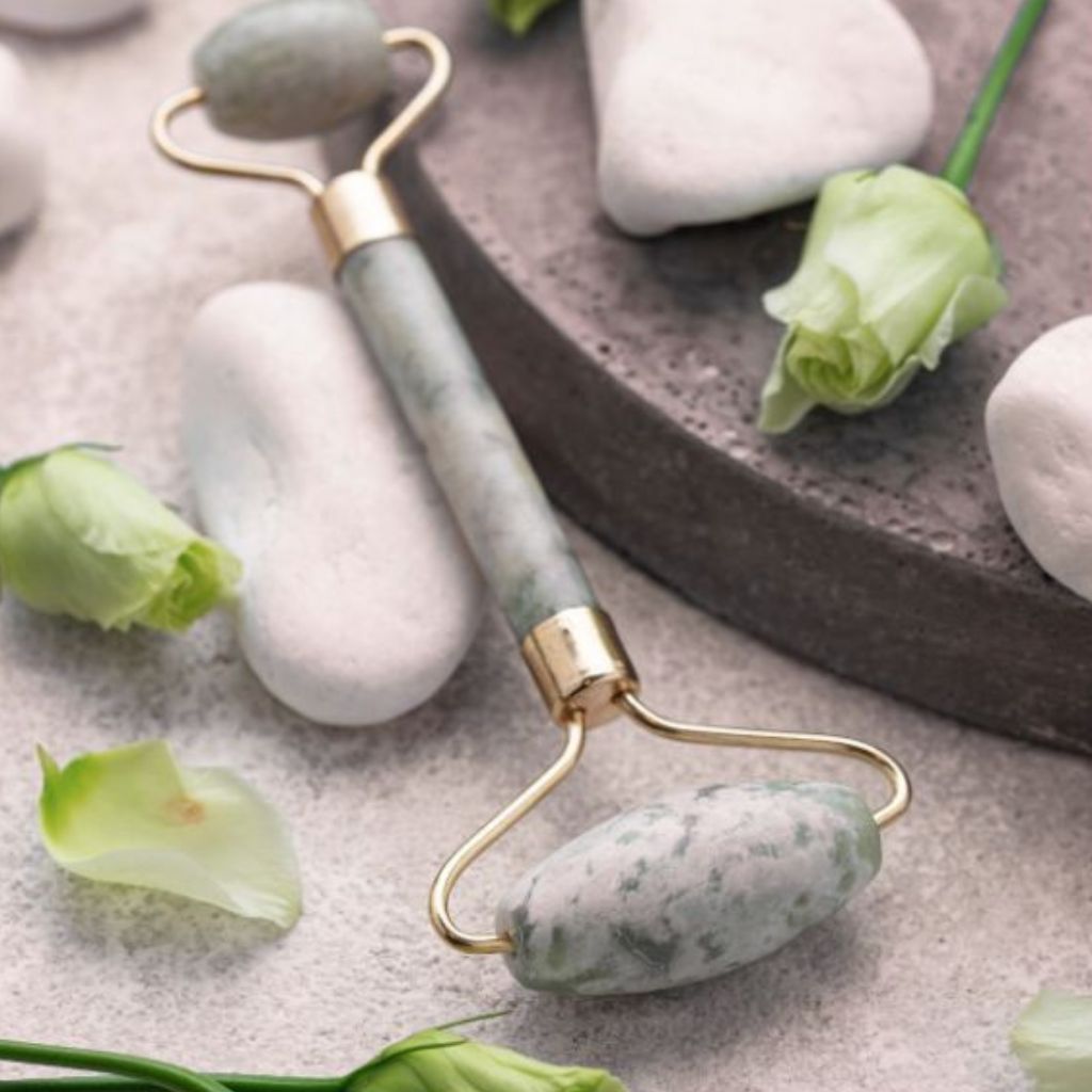 Shop Facial Rollers including jade and rose quartz beauty tools designed to support glowing skin, facial massage, and relaxing skincare routines.