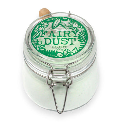 Jar labeled 'Fairy Dust' with a green lid on a white background