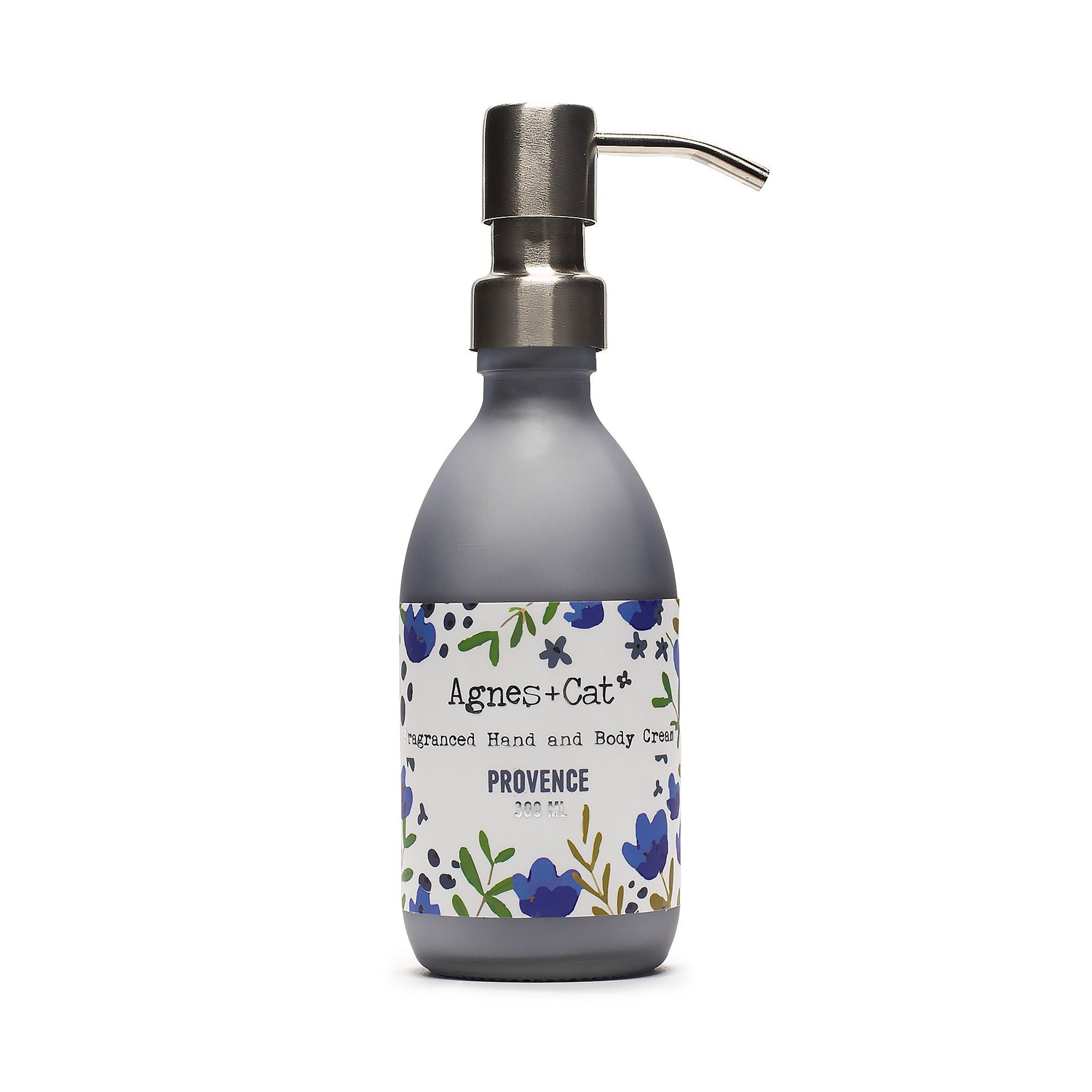 Hand cream bottle with floral label on a white background