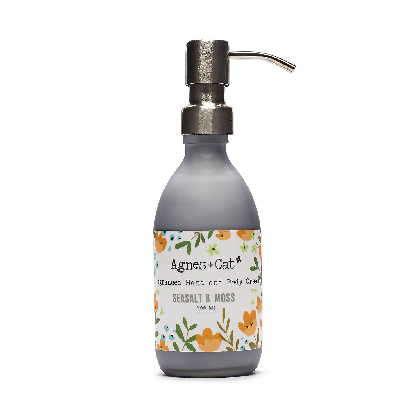Hand cream bottle with floral label on a white background