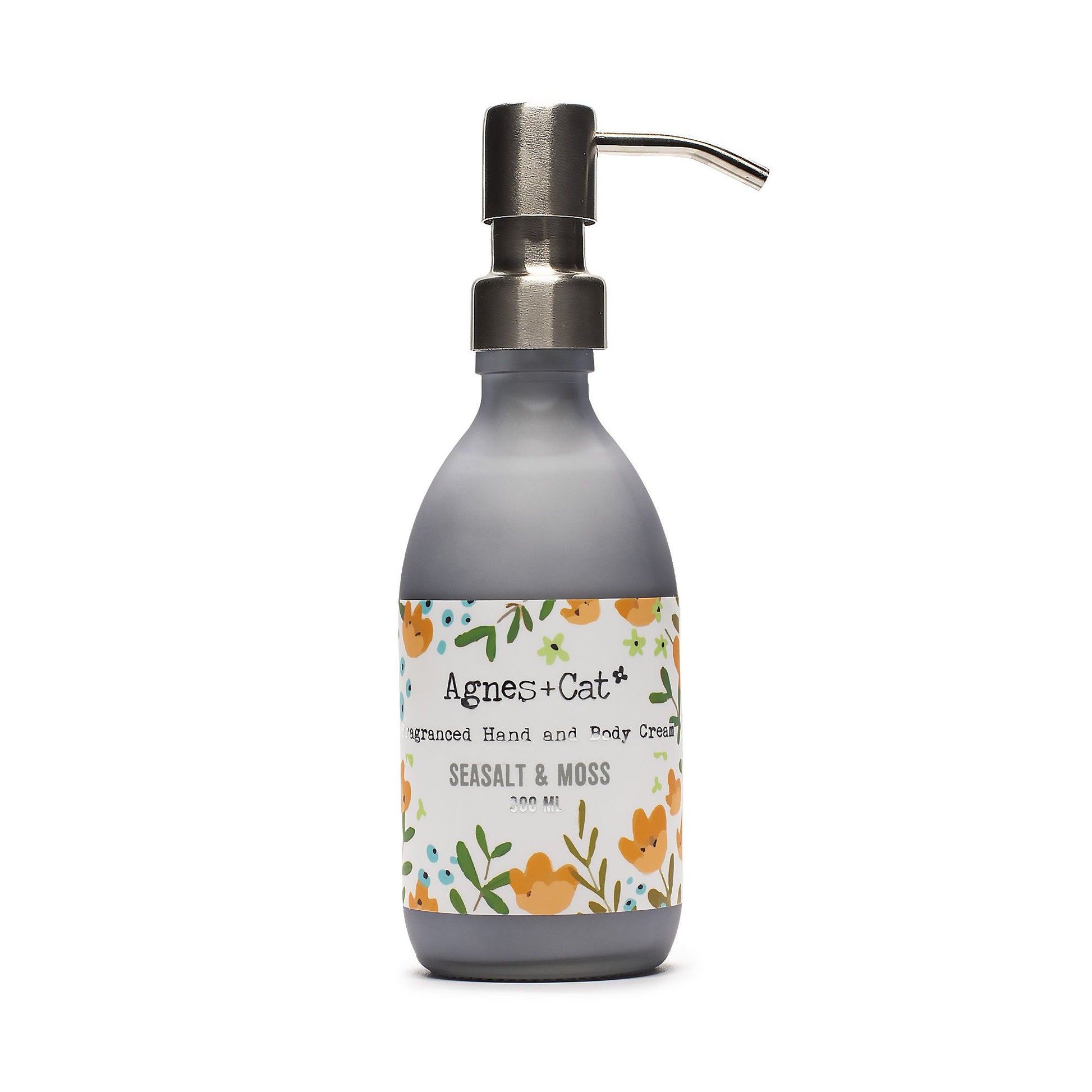 Hand cream bottle with floral label on a white background