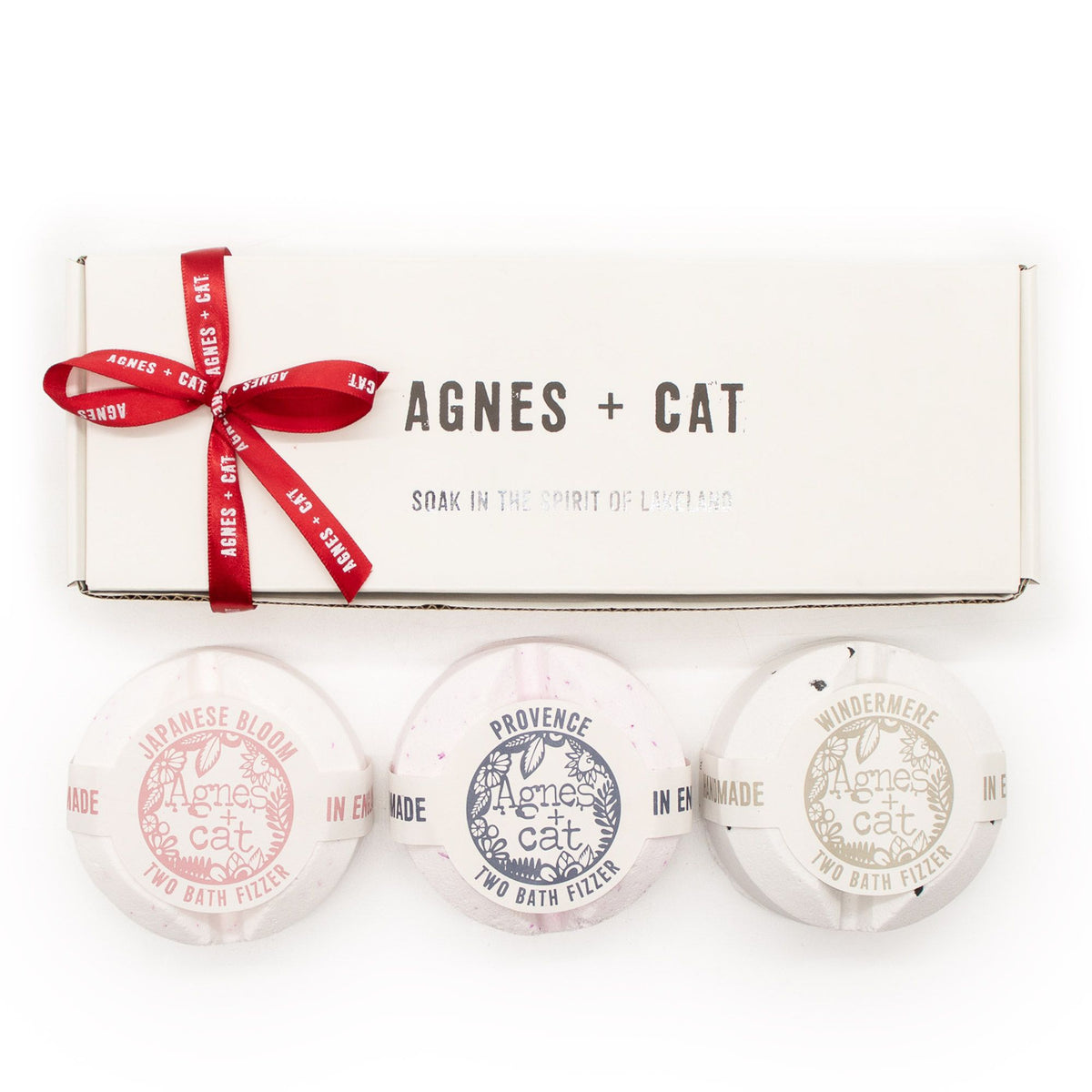 Three bath fizzers with 'Agnes + Cat' branding on a white background