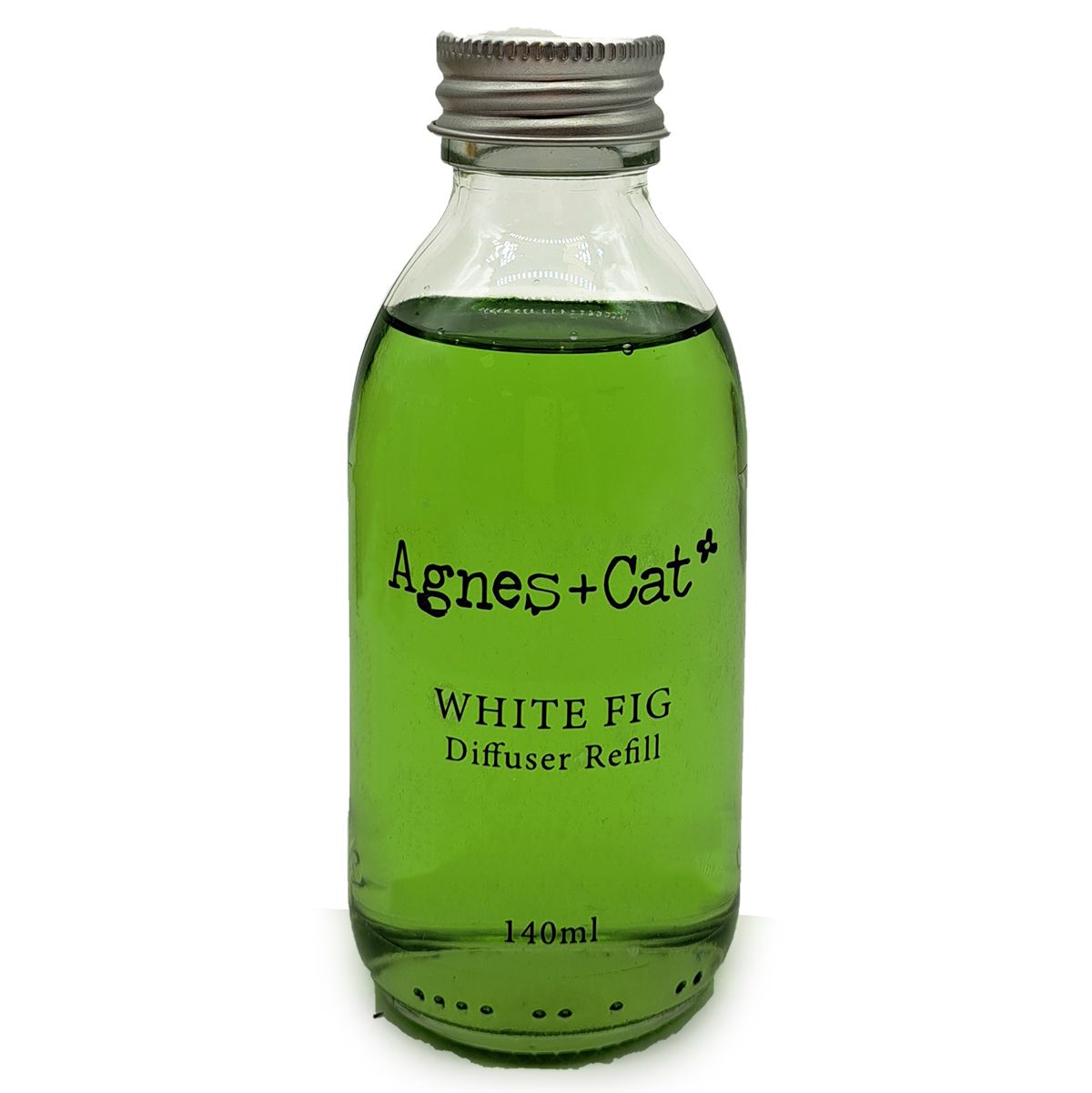 Green bottle of Agnes + Cat White Fig diffuser refill on a white background