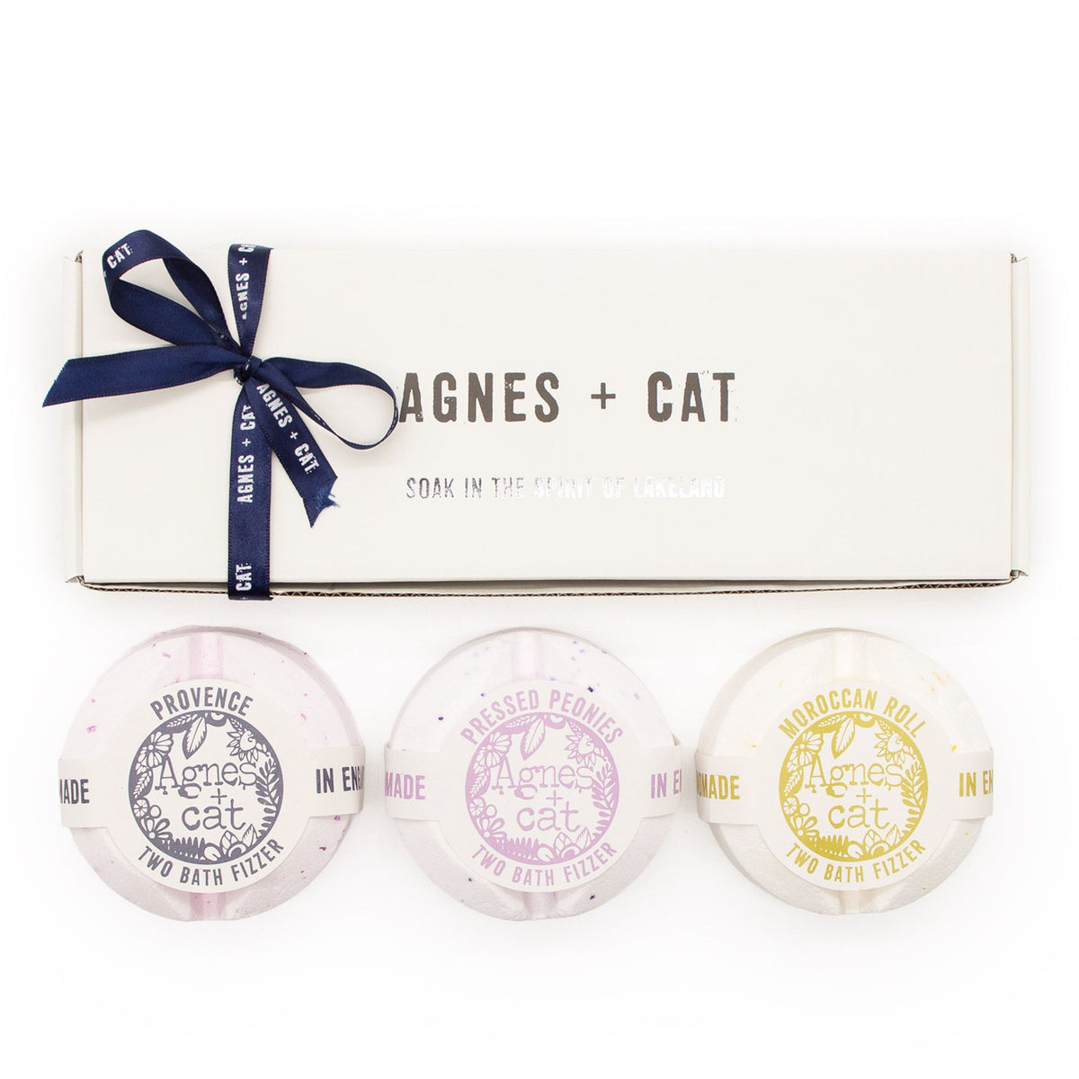 Set of three bath fizzers with 'agnes + cat' branding on a white background