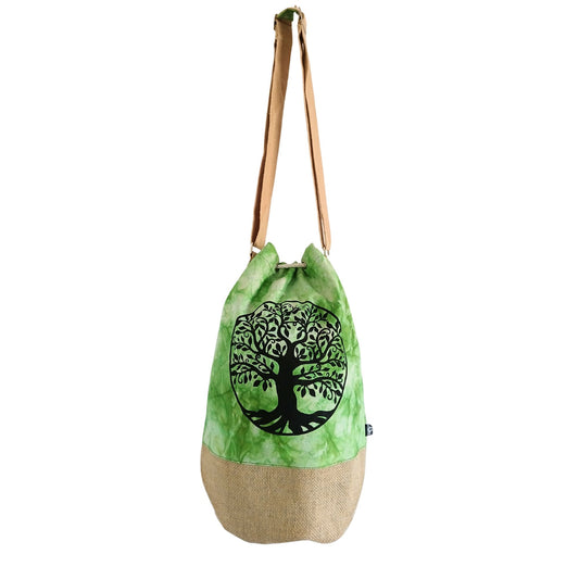 Green drawstring bag with a tree design on a white background