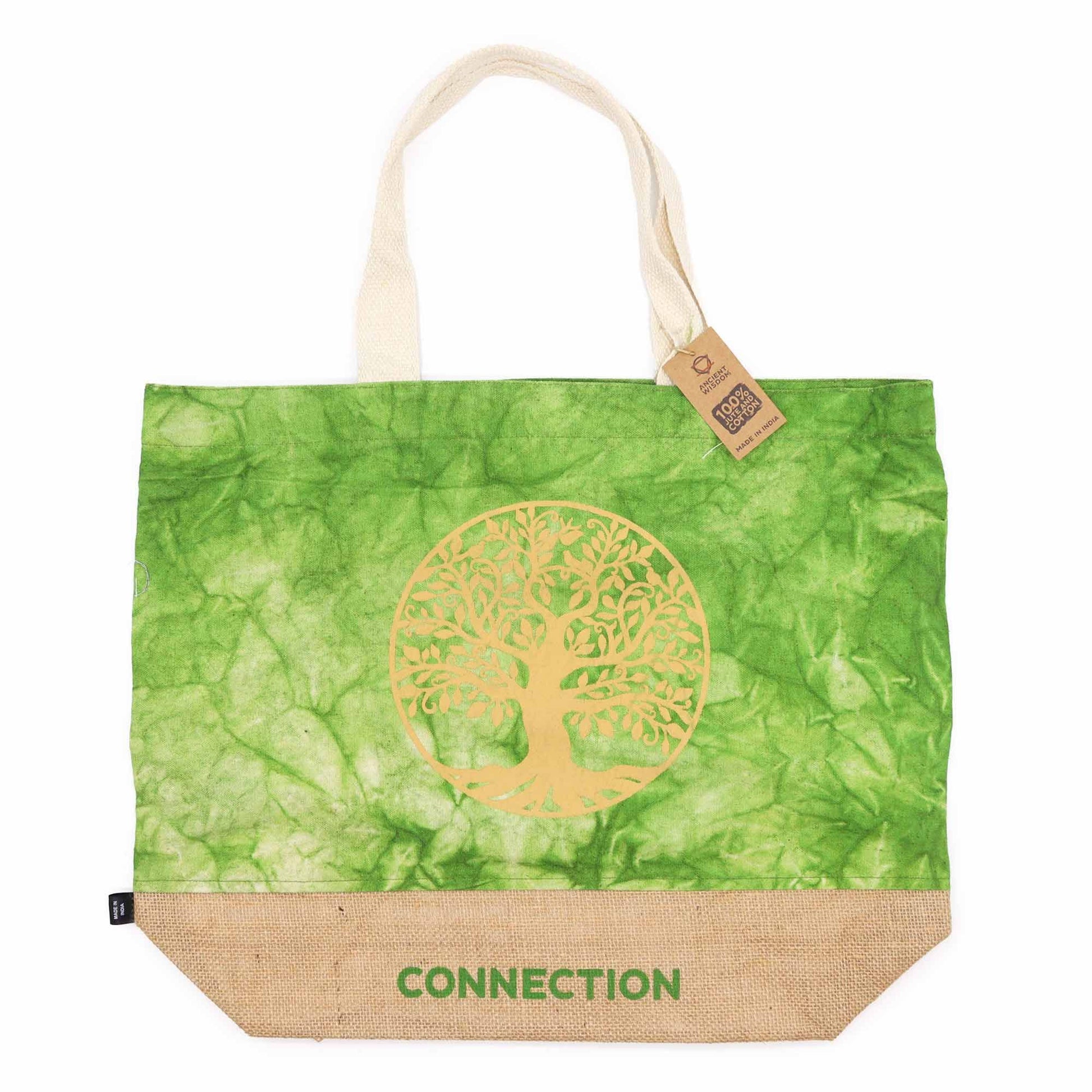 Green tote bag with gold tree design and 'Connection' text on a white background