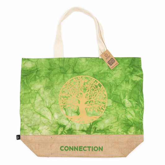 Green tote bag with gold tree design and 'Connection' text on a white background