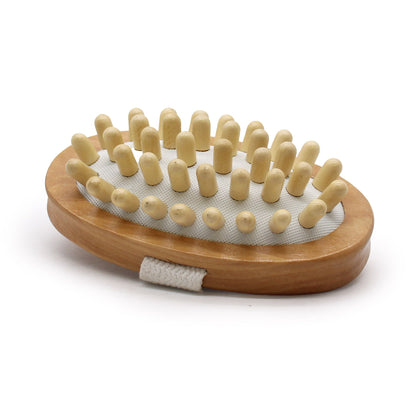 Wooden brush with bristles on a white background