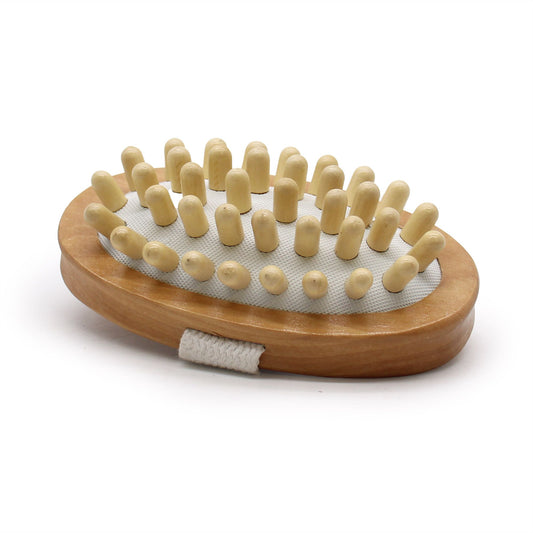Wooden brush with bristles on a white background