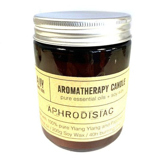 Aromatherapy candle jar labeled 'Aphrodisiac' on a white background