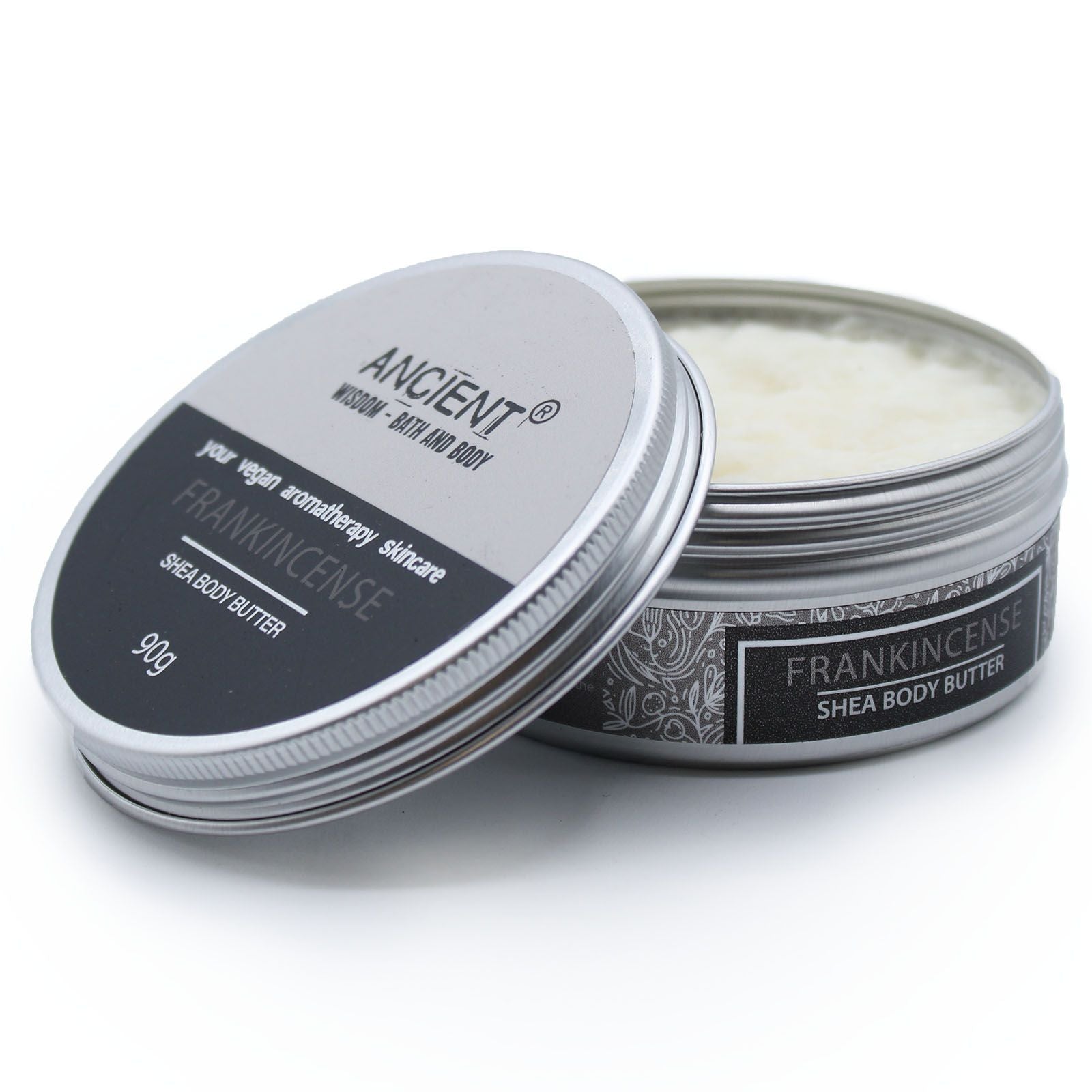 Shea body butter container with lid open on a white background