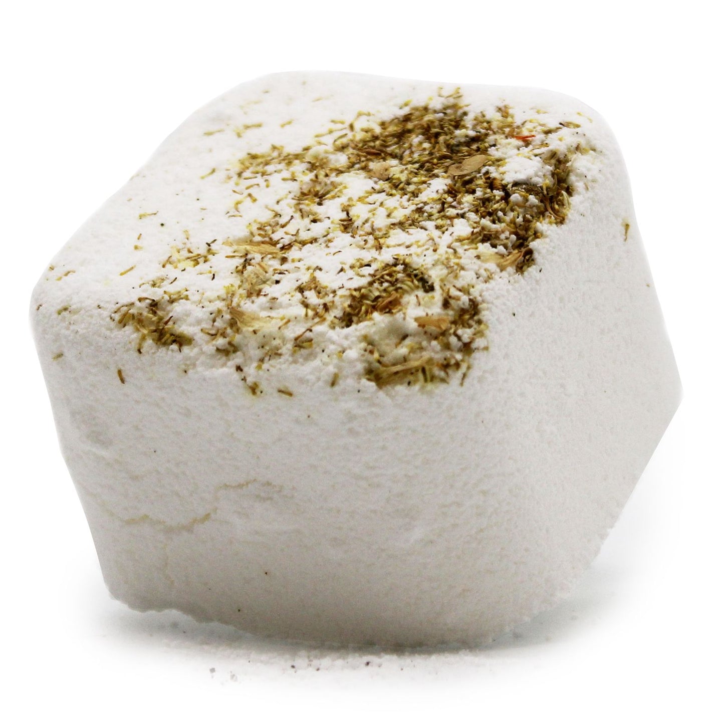 Hexagonal bath bomb with green herb-like substance on a white background