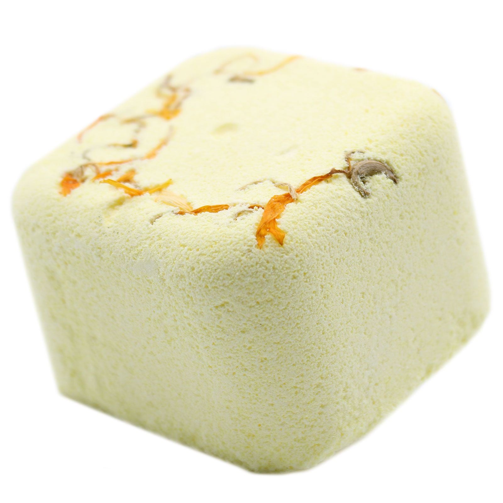 Square bath bomb with orange and brown specks on a white background