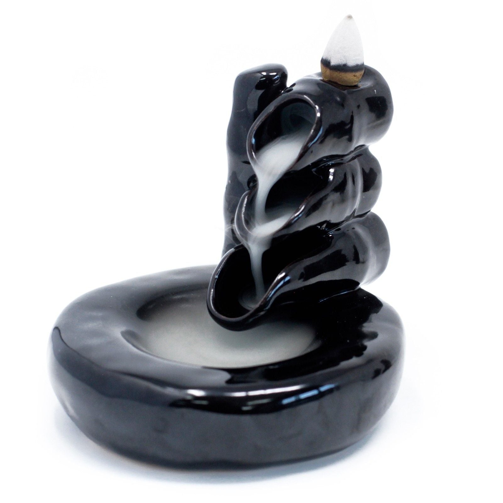 Black incense burner with smoke on a white background