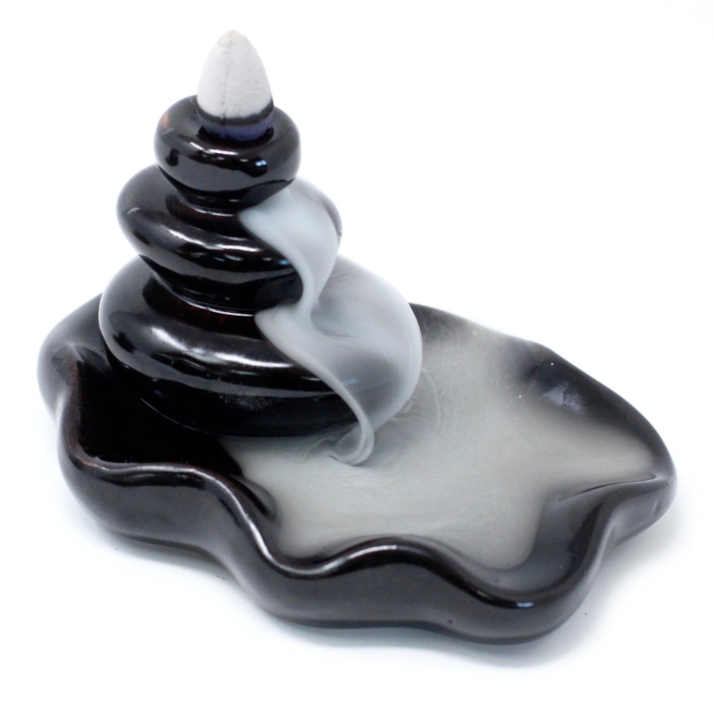 Black and white ceramic incense burner on a white background