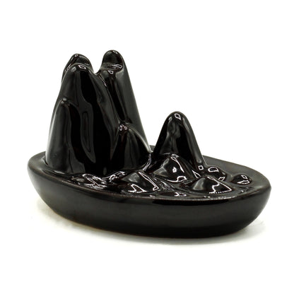 Transform your home into a tranquil haven with a backflow incense burner Mini Mountain. Designed to work with backflow incense cones. 