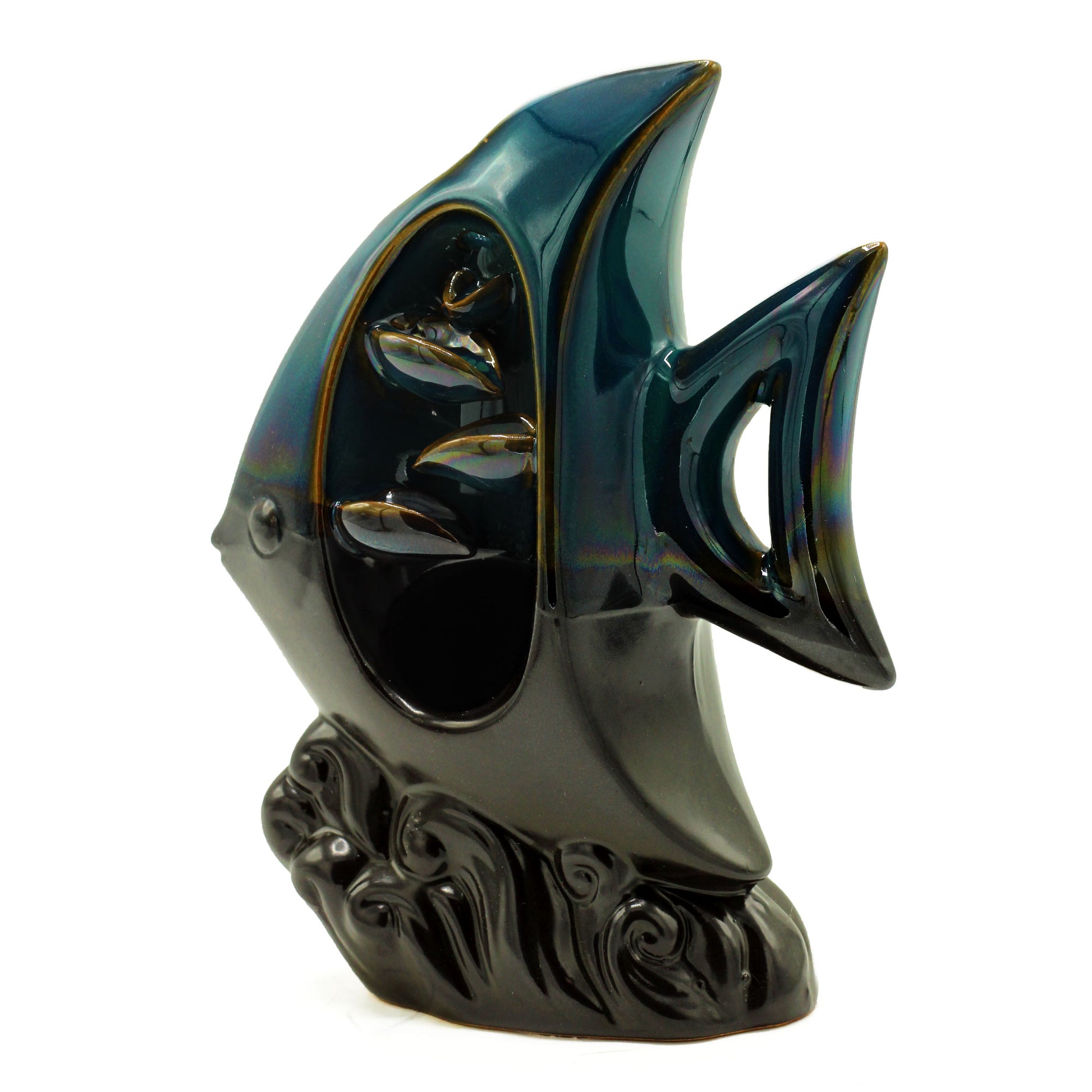 Transform your home into a tranquil haven with a backflow incense burner Tropical Fish. Designed to work with backflow incense cones. 