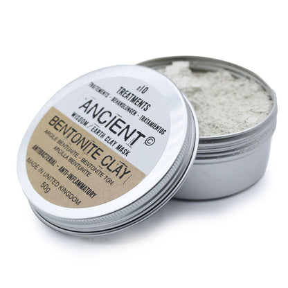 Bentonite clay mask in a metal container with a white lid on a white background