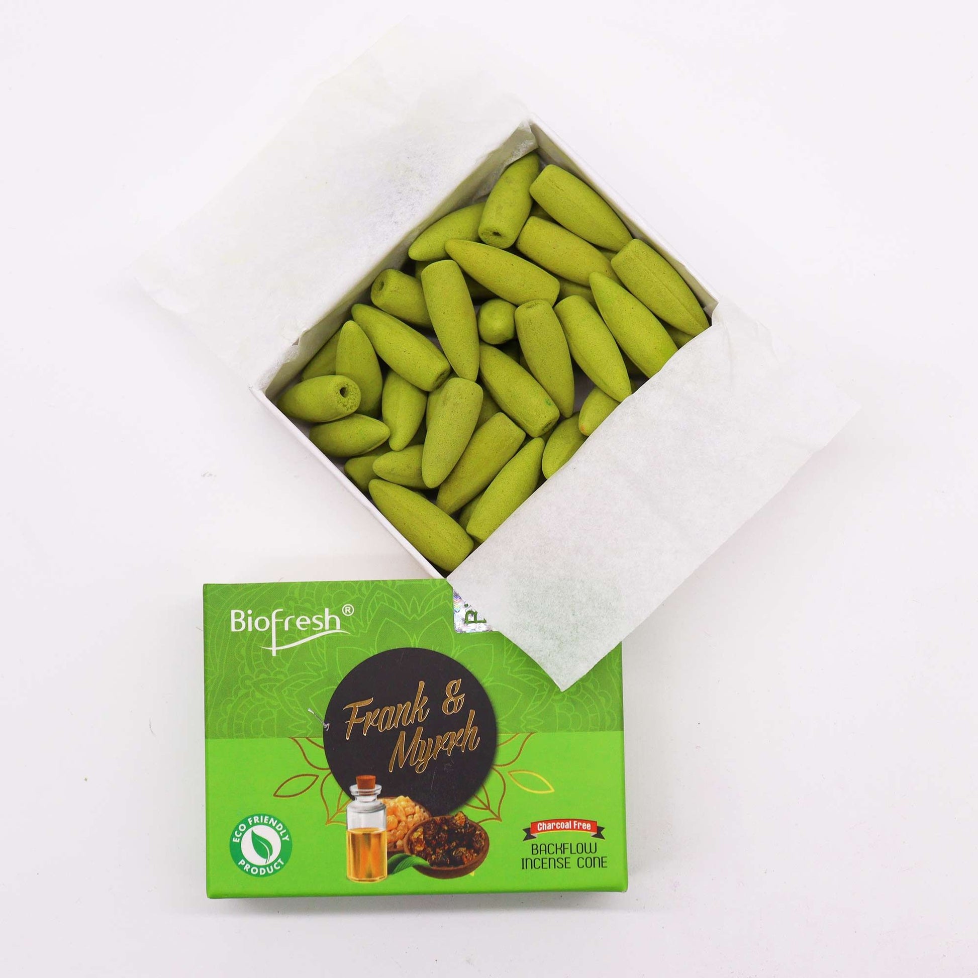 Box of green marbles with a Biofresh label on a white background