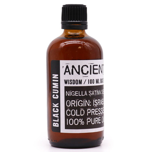 Bottle of 'Ancient Wisdom' black cumin oil on a white background