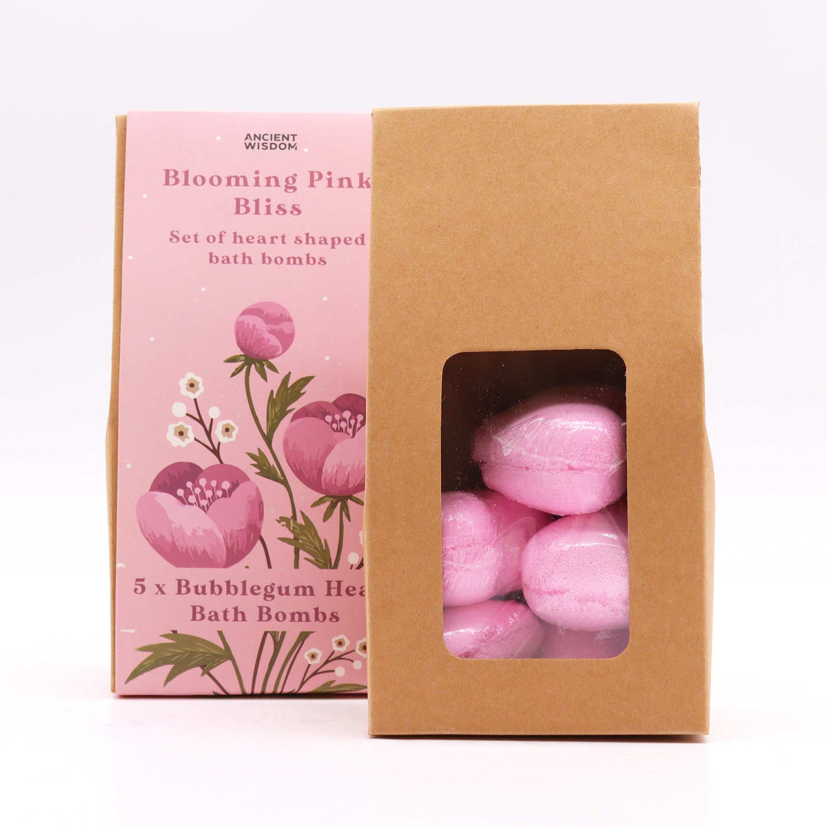 Pink heart-shaped bath bombs in a brown box with a pink packaging featuring floral designs.