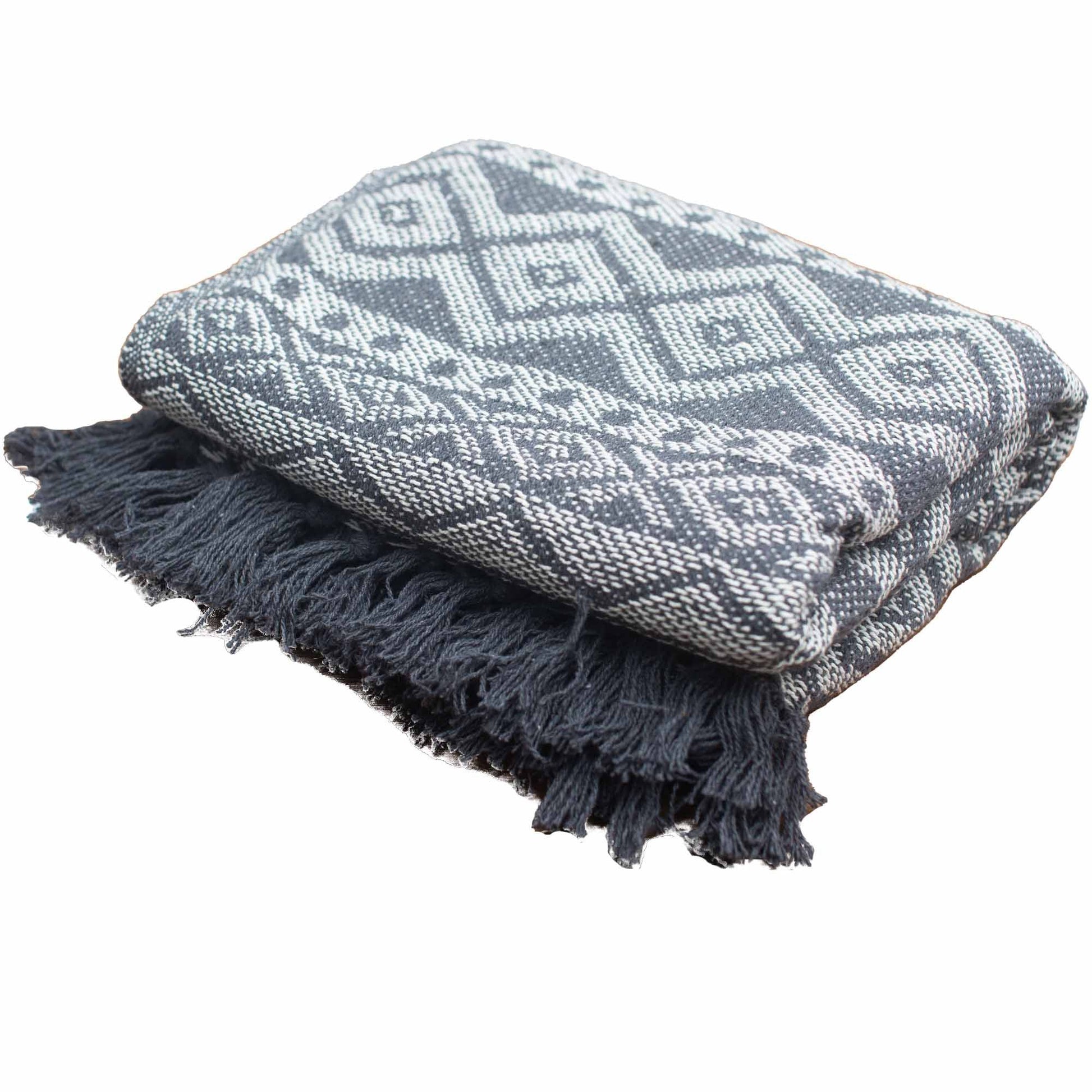 Gray and white patterned throw blanket with fringes on a white background