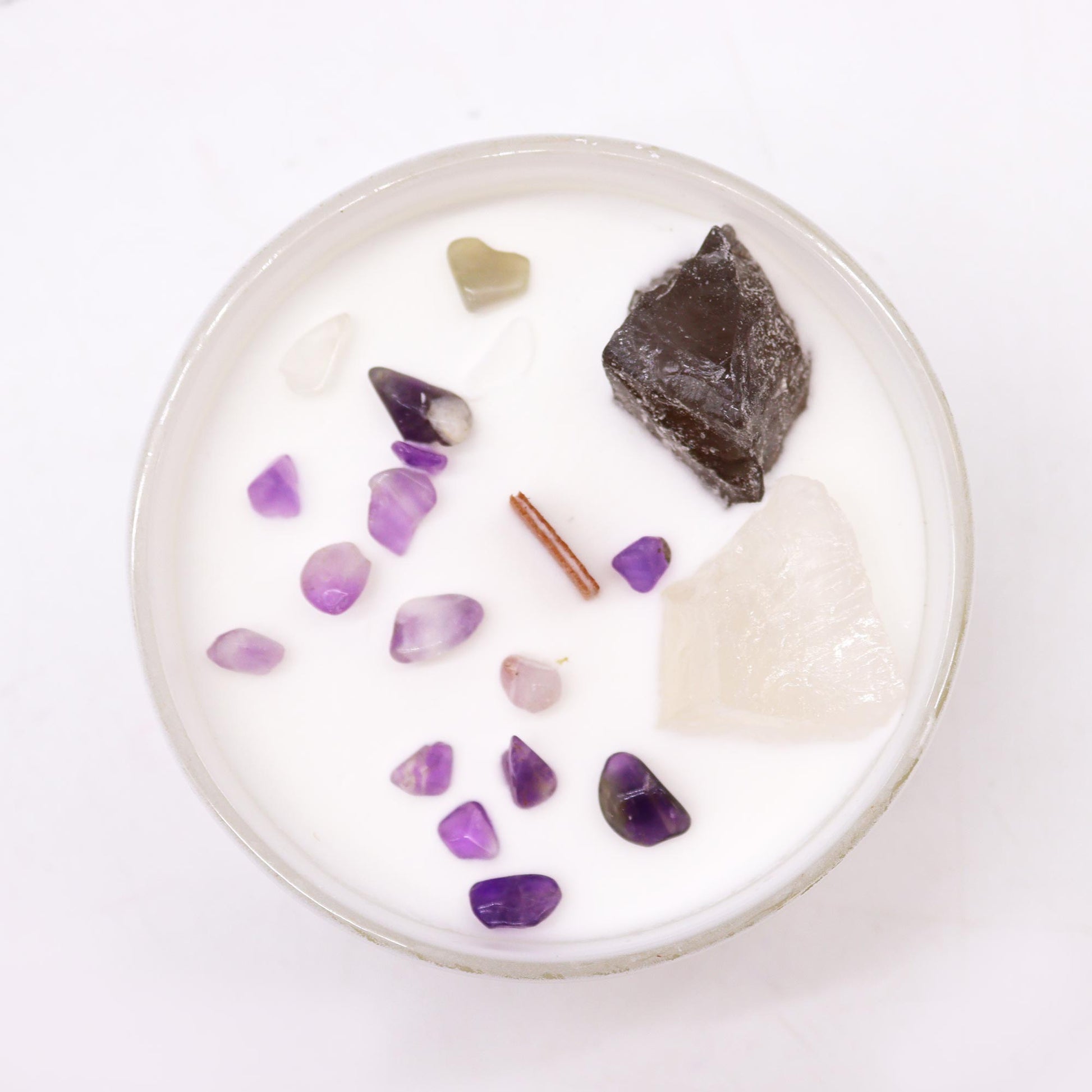 Crown Chakra with this enchanting soy wax crystal candle. Embedded with Celestite and Selenite crystals.