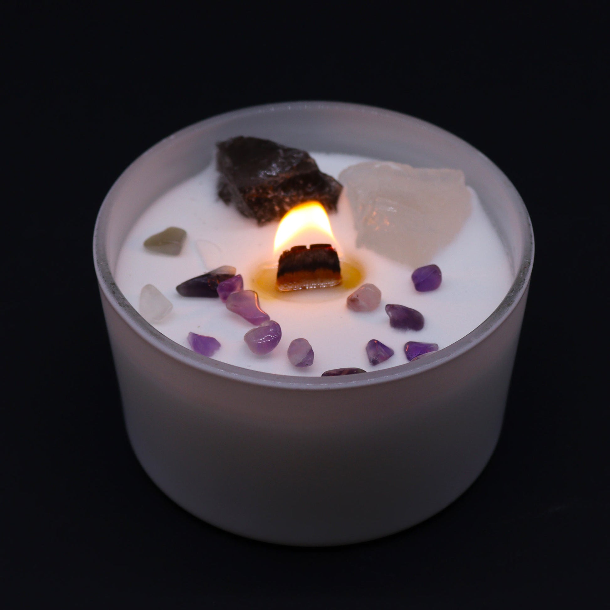 Crown Chakra with this enchanting soy wax crystal candle. Embedded with Celestite and Selenite crystals lit candle