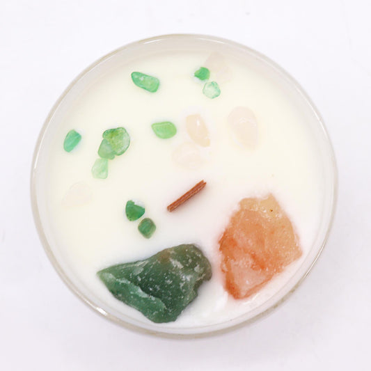 Unlock the power of your Heart Chakra with this enchanting soy wax crystal candle. Embedded with Rose Quartz and Crystal Jade crystals.