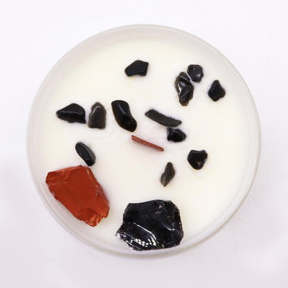 Unlock the power of your Root Chakra with this enchanting soy wax crystal candle. Embedded with Red Jasper & Black Agate, gemstones.