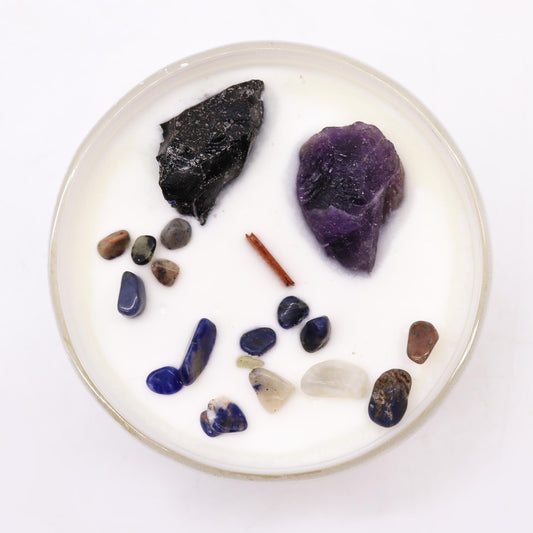 Unlock the power of your Solar Plexus Chakra with this enchanting soy wax crystal candle. Embedded with Amethyst and Black Agate crystal gemstones.