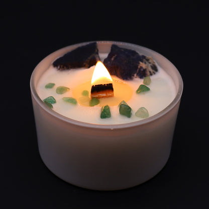 Unlock the power of your Throat Chakra with this enchanting soy wax crystal lit candle. Embedded with Sodalite and Jade Chips gemstones.