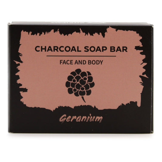 Charcoal soap bar packaging with 'Geranium' flavor on a white background