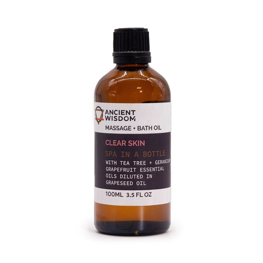 Bottle of Ancient Wisdom Clear Skin massage and bath oil on a white background