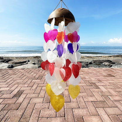 Add a splash of coastal charm to your home or garden with these beautiful Coconut &amp; Capiz Windchimes Big Hearts 